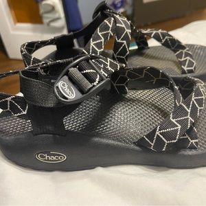 Black and white pattern Chaco. Gently used condition. Lots of wear left.